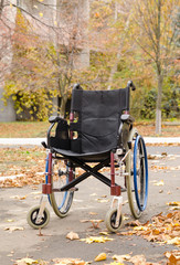 Fototapeta na wymiar One wheelchair outdoors in the park