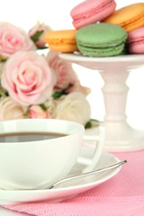 Coffee and macaroons close-up