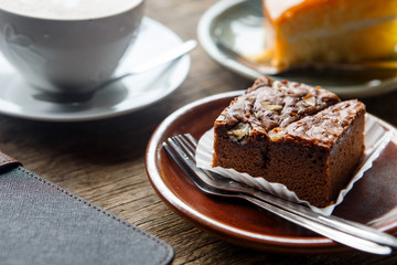 chocolate cakeon grunge wood background