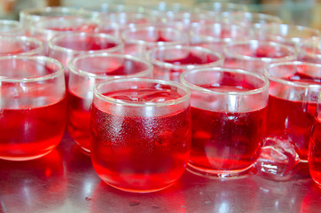 Red fruit flavor soft drinks whit soda water
