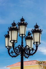 Fototapeta na wymiar Vintage Outdoor Lamp with blue sky