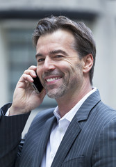 Successful Businessman On the Phone At The Office