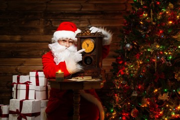 Santa Claus in wooden home interior 