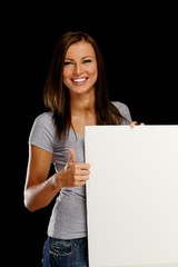 Fototapeta premium Beautiful young brunette woman with blank notice board