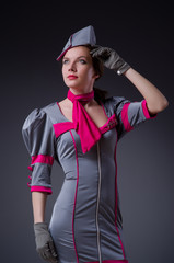 Female flight attendant in studio