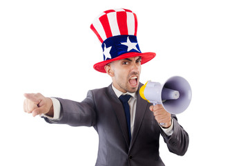 Man with loudspeaker and american hat