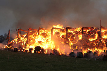 Burning farm building with hay © Andrius Vaišnoras