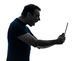 man holding digital tablet  screaming angry furious