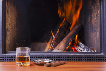 drinks at fireplace on winter evening