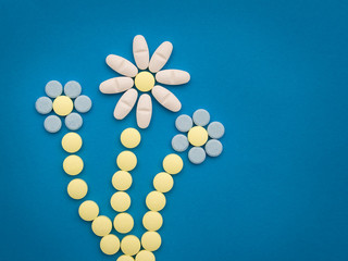 pills on the blue background