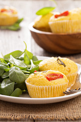 Savory muffins with corn flour, tomatoes and rosemary