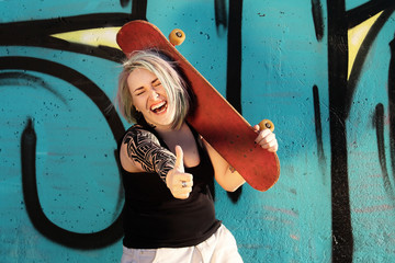 The girl with skateboard.
