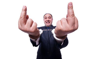 Businessman with handcuffs on white