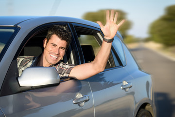 Man driving car on road