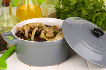 Fried chicken livers in pan