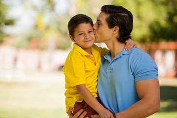 Happy little boy and his dad
