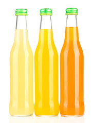 Bottles with tasty drink, isolated on white