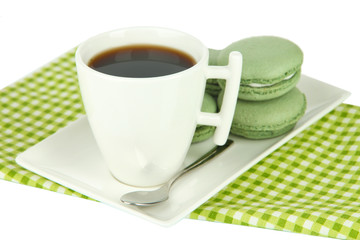 Coffee and macaroons isolated on white
