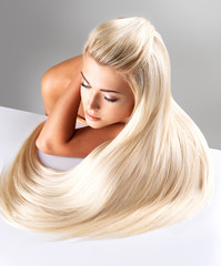 Blond woman with long straight hair