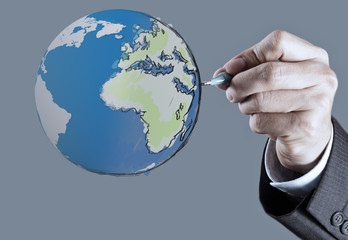 Male hand drawing Globe