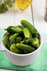 Fresh cucumbers on wooden background