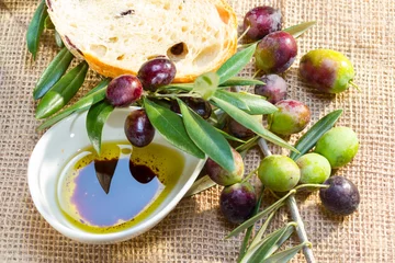 Foto op Plexiglas Ciabatta bread with olive oil. © snyfer