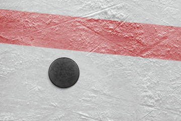 Puck on a hockey rink - obrazy, fototapety, plakaty