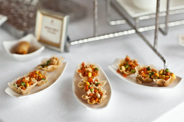 Luxury food and drinks on wedding table. Different sort of canap