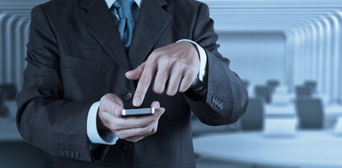 businessman hand use smart phone computer with email icon as con