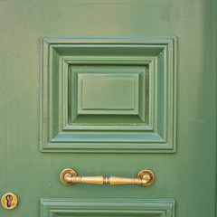 Obraz premium wooden green door closeup