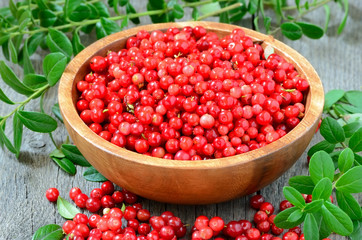Cowberries in brown bowl