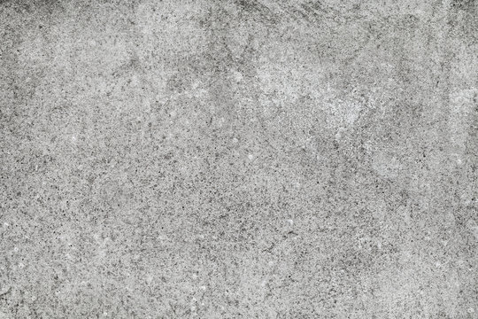 Gray rough concrete wall background photo texture