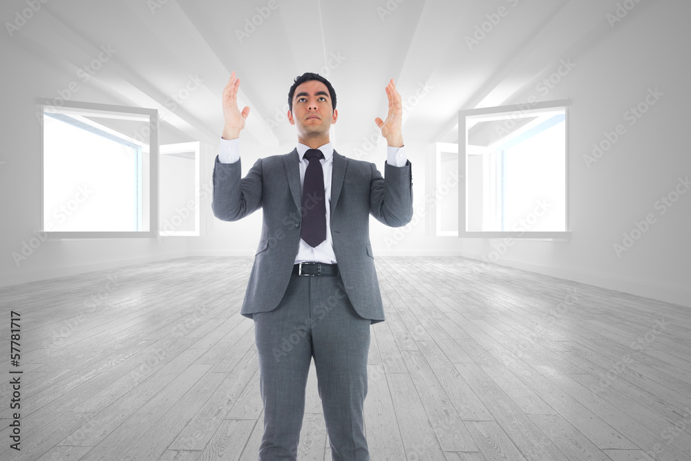 Poster composite image of unsmiling businessman with arms raised
