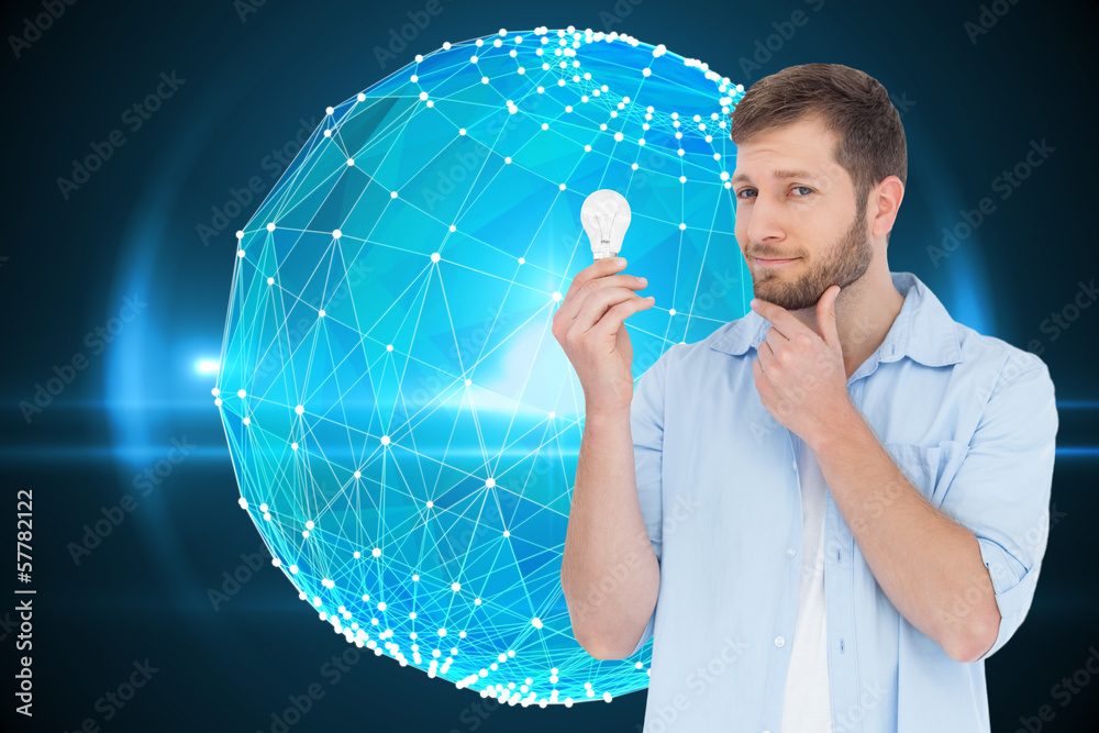 Poster composite image of handsome model holding a bulb