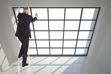 Composite image of mature businessman climbing career ladder