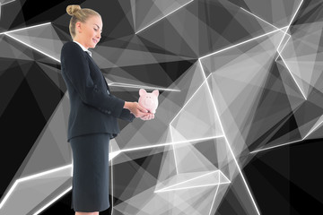 Composite image of businesswoman holding pink piggy bank