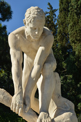 Fototapeta na wymiar The wood breaker marble statue - Athens National Garden
