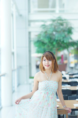 Beautiful young woman posing in a restaurant