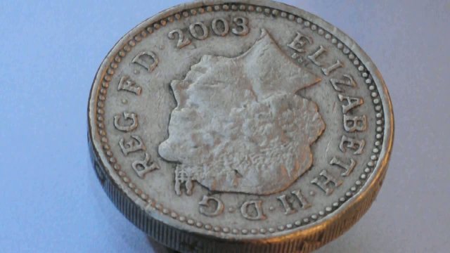 british one pound coin spin