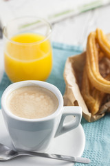 Breakfast with coffee and churros