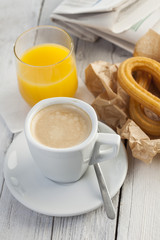 Breakfast with coffee and churros