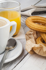 Breakfast with coffee and churros