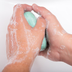 Fototapeta premium Washing hands with soap and water