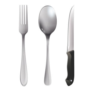 Realistic knife, fork and spoon over white