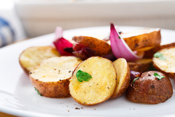 Baked potato with red onion