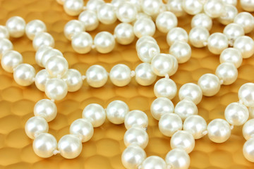 Color beads on bright background, close-up