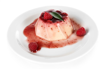 Panna Cotta with raspberry sauce, isolated on white