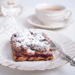 Cake on a plate and coffee.