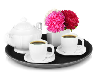Cups of coffee on tray isolated on white