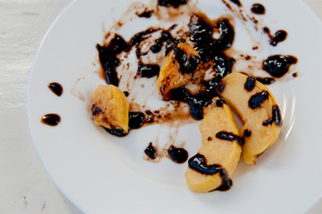 quince with chocolate syrup
